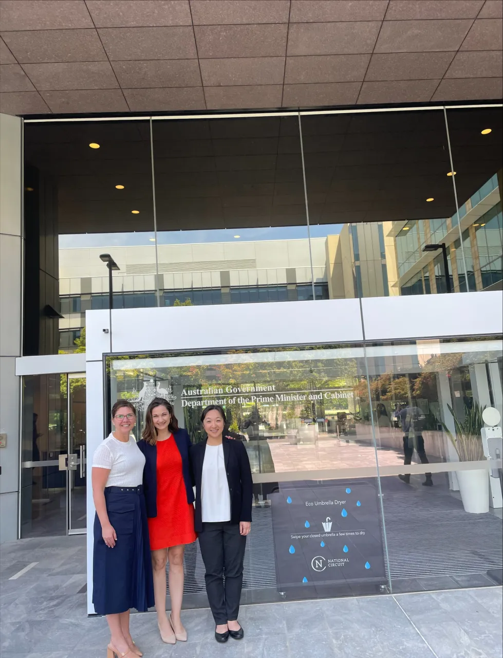 Image: DHS Principal Director Kristen Best and delegation in front of the Australia Department of the Prime Minister and Cabinet in Canberra, Australia