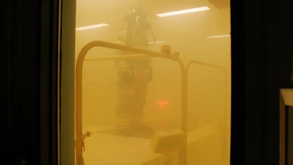 Test subject stands in smoke-filled testing chamber