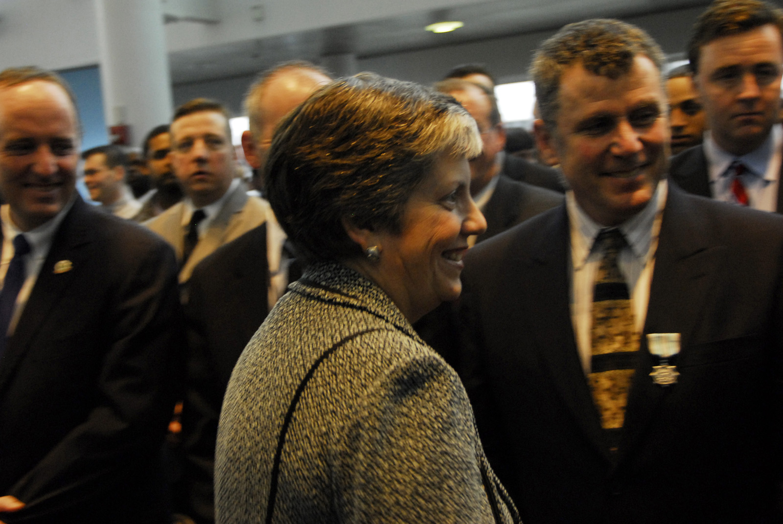 Secretary Napolitano congratulates recipients of Coast Guard public service awards at a ceremony honoring first responders during the US Airways Flight 1549 crash in the Hudson River.
