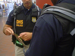 Two DHS officers in discussion