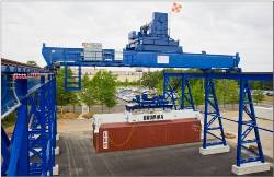 Located at the Transportation Security Laboratory, S&T’s Cargo Security Test Bed lifts a 40-foot container.