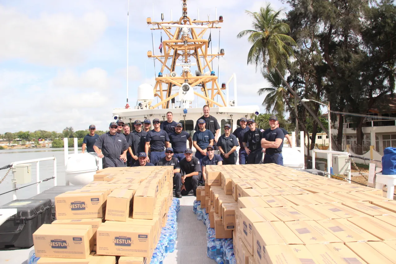 Image: Coast Guard, Dominican navy onload food donation for Hurricane Maria victims in Dominican Republic