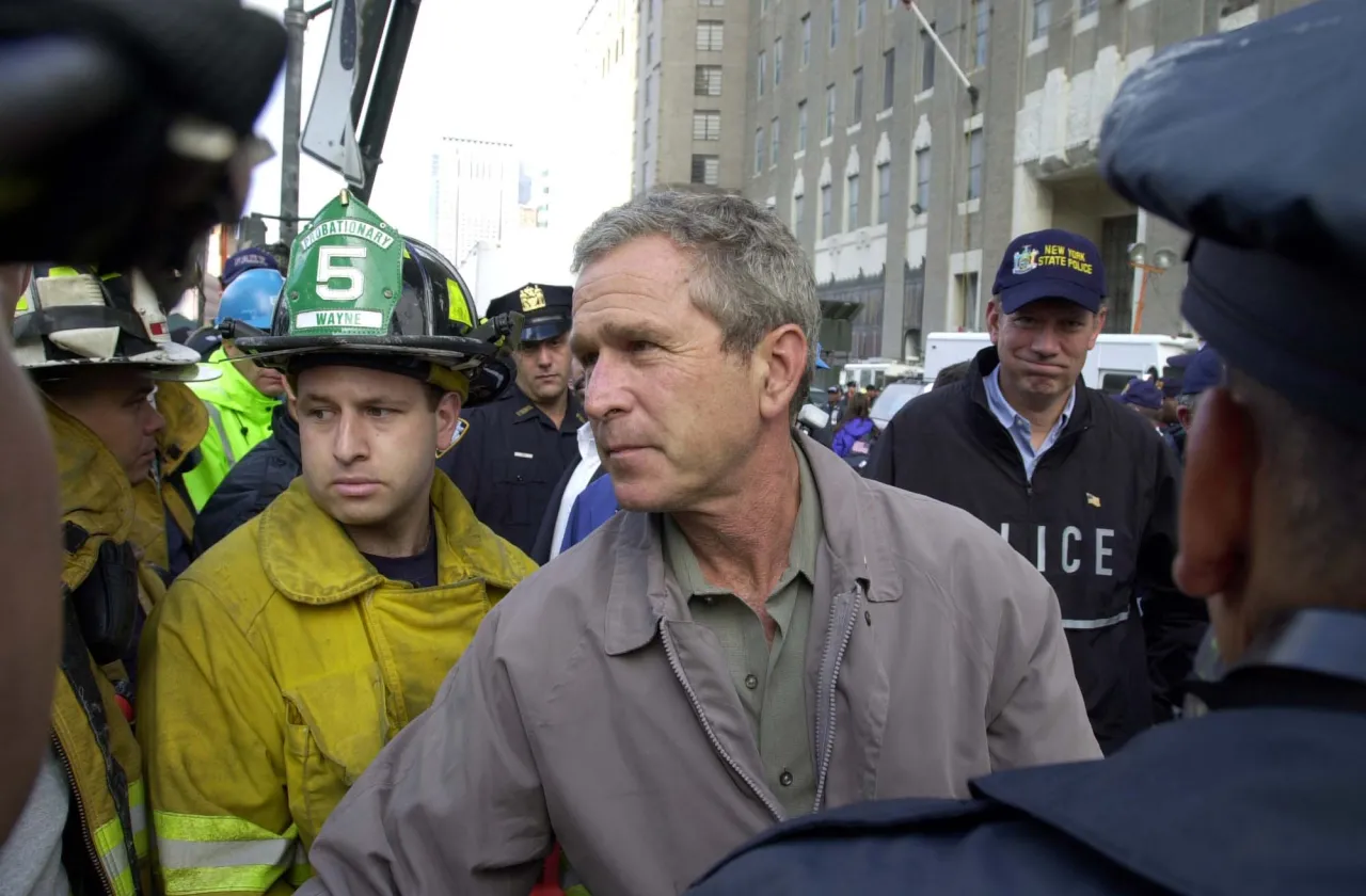 Image: 9/11 - President Bush greets and offers words of hope and consolation to rescue workers