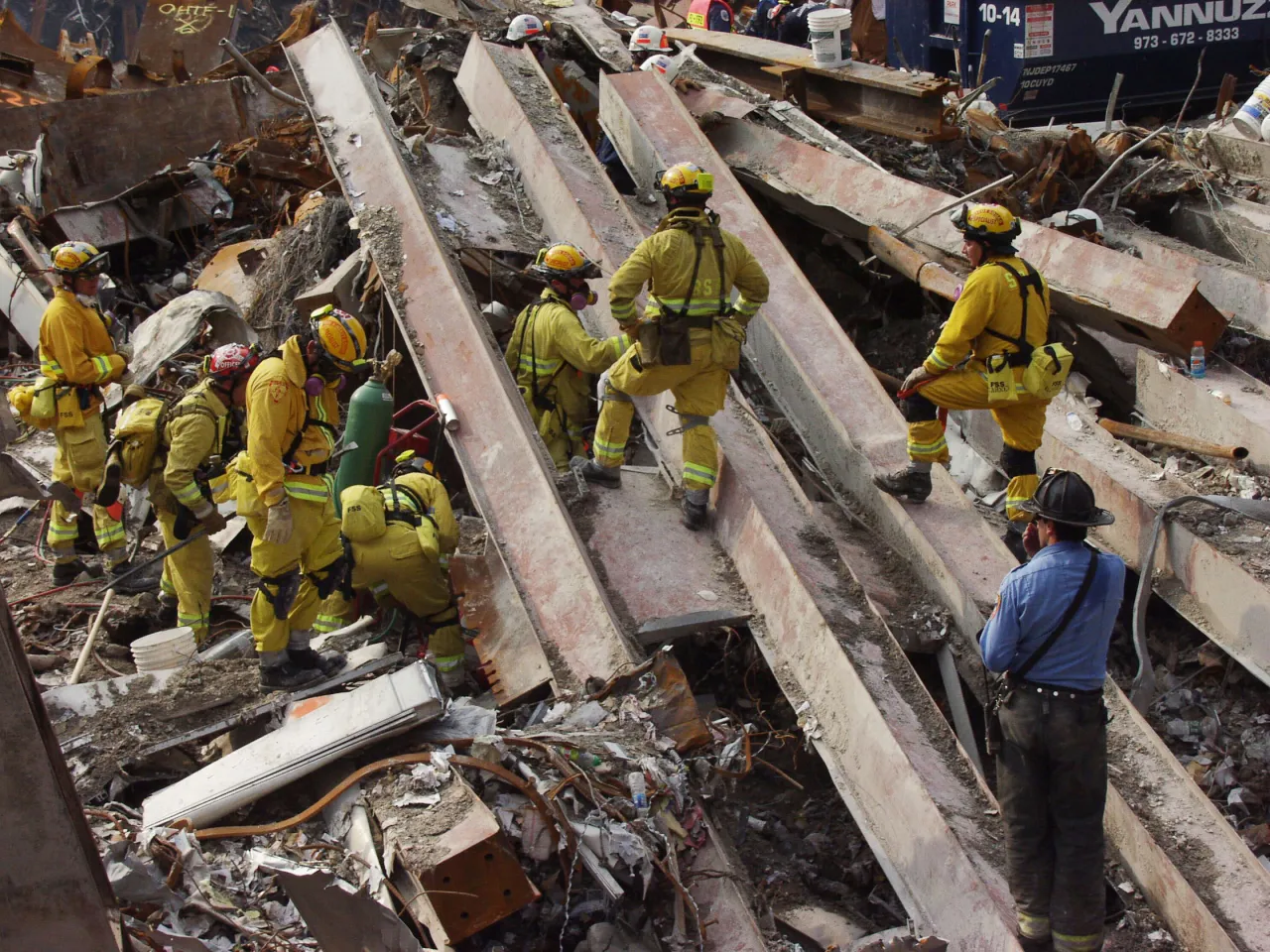 Image: 9/11 - New York City fire fighters continue to search for survivors at Ground Zero (2)