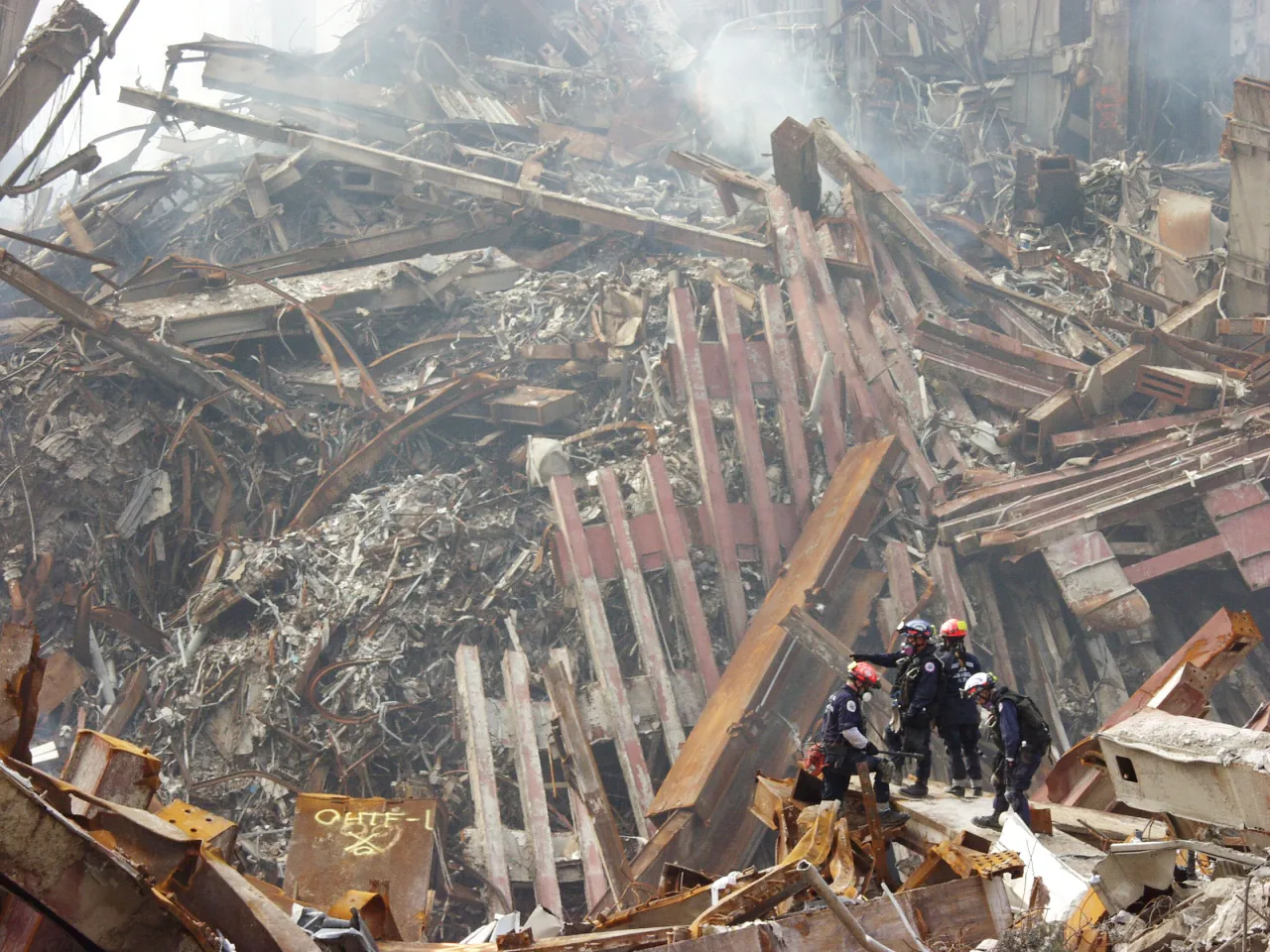 Image: 9/11 - Urban Search and Rescue teams continue to search for survivors amongst the wreckage at the World Trade Center (4)