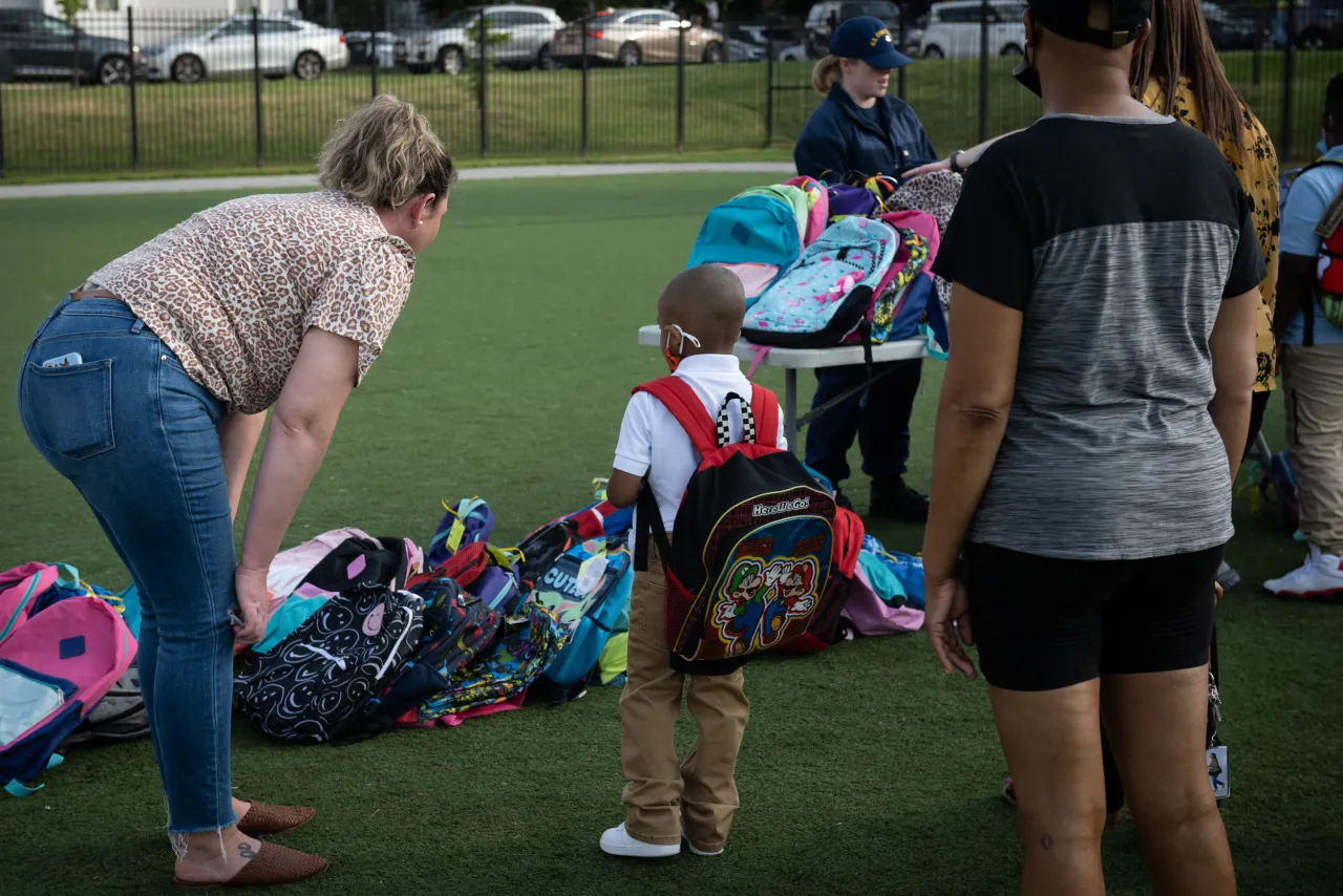 Image: Coast Guard Members Distribute Backpacks at Turner Elementary School (013)