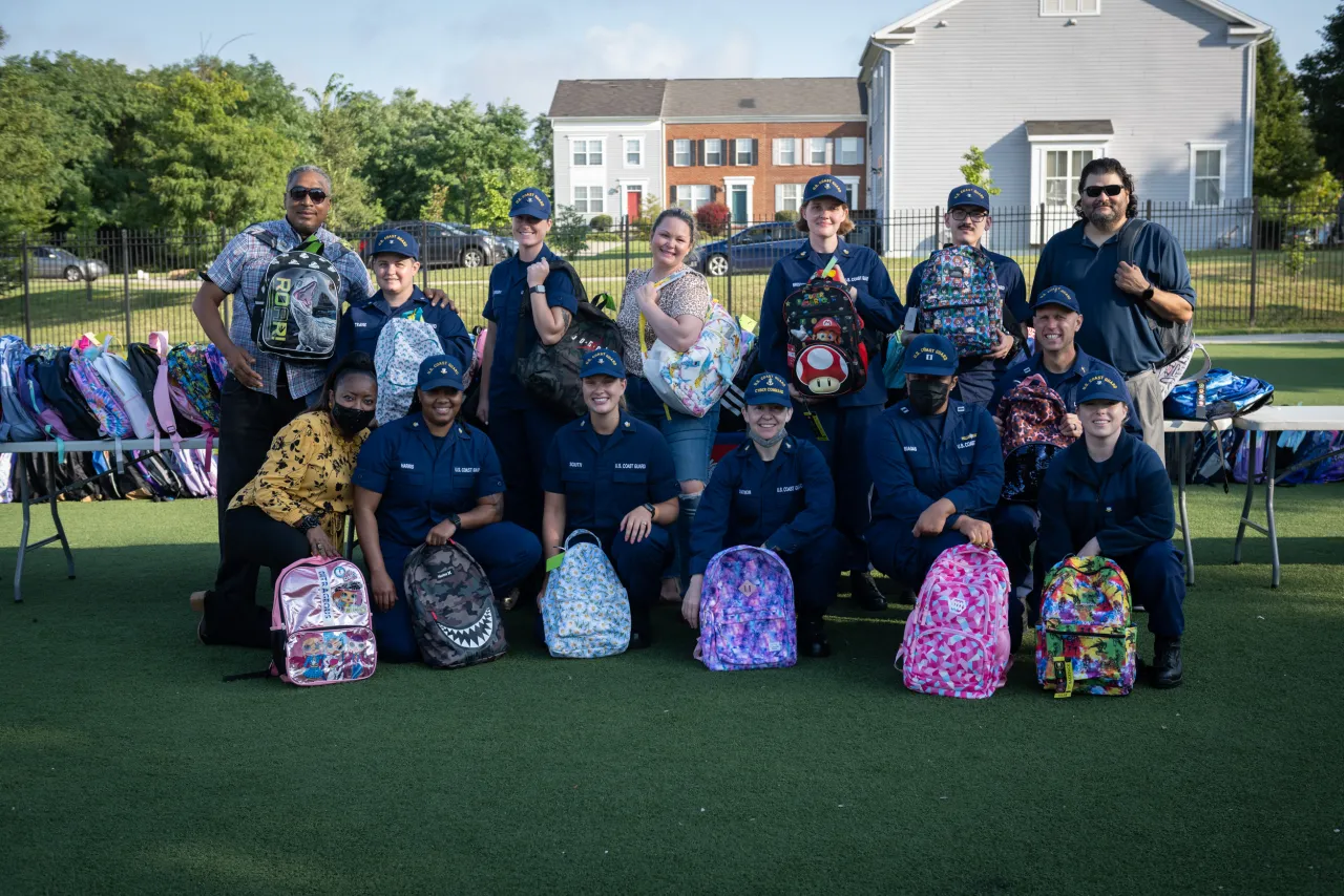 Image: Coast Guard Members Distribute Backpacks at Turner Elementary School (001)