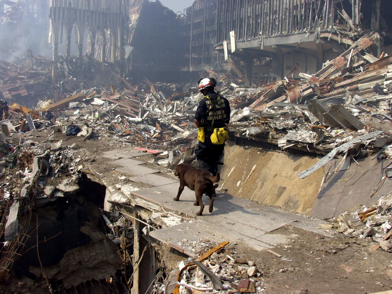 Image: 9/11 - Urban Search and Rescue teams continue to search for survivors amongst the wreckage at the World Trade Center (3)