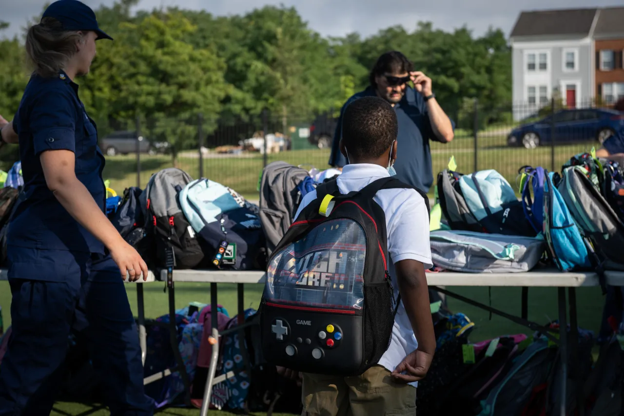 Image: Coast Guard Members Distribute Backpacks at Turner Elementary School (009)