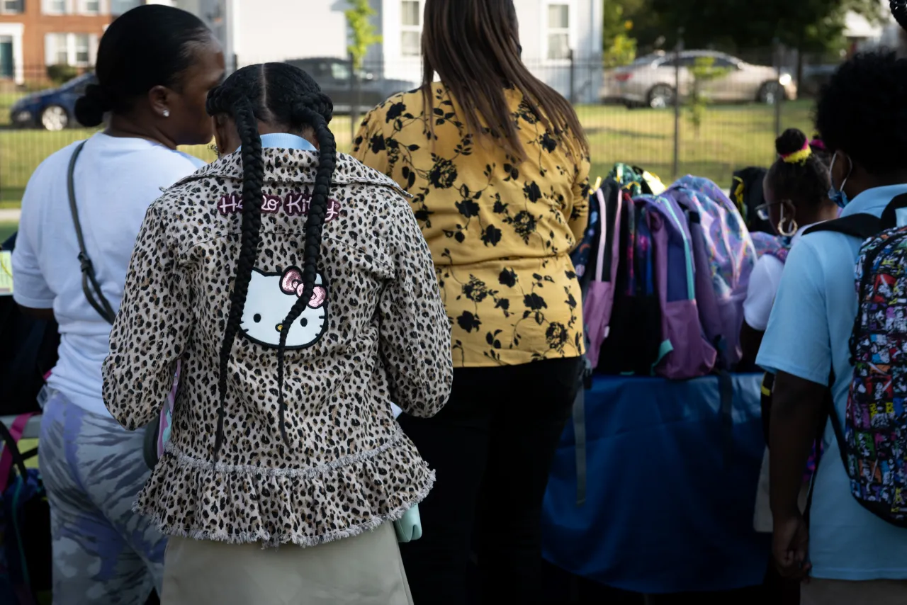 Image: Coast Guard Members Distribute Backpacks at Turner Elementary School (007)