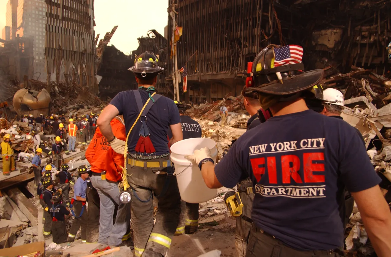 Image: 9/11 - New York City fire fighters continue to search for survivors at Ground Zero