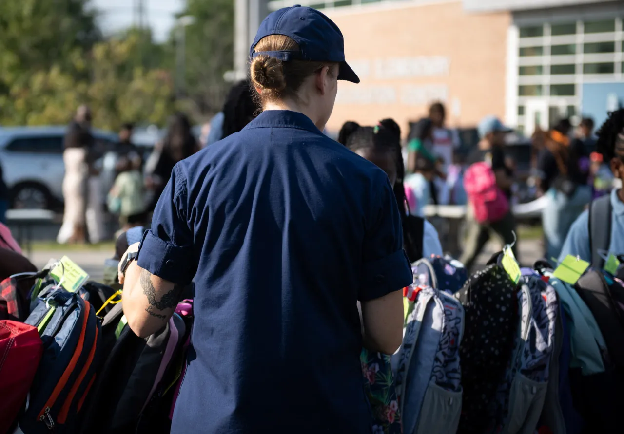 Image: Coast Guard Members Distribute Backpacks at Turner Elementary School (016)