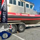 Image: Coast Guard Marathon Medal with a Special Purpose Craft Law Enforcement boat.