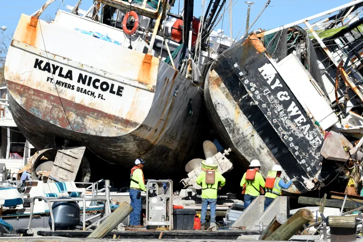 Image: Crews Work to Access Boats That Have Been Damaged by Hurricane Ian