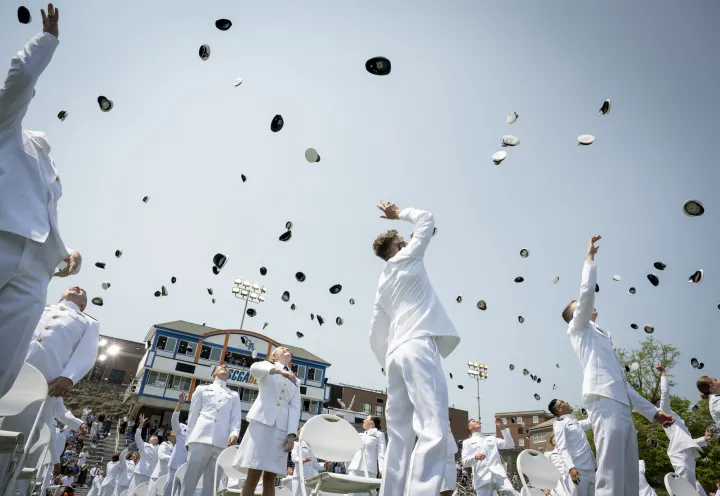 Image: U.S. Coast Guard (USCG) Academy Graduates Throw Their Caps Up in Celebration