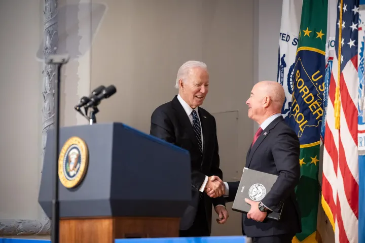 Image: President Biden shakes hands with Secretary Mayorkas