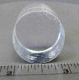 A 1” diameter by 1” long right cylinder crystal