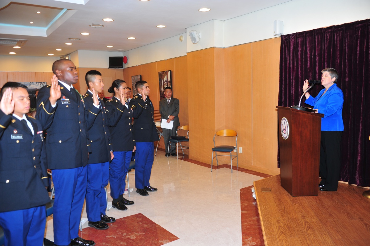 Secretary Napolitano participates in a naturalization ceremony for US service members stationed abroad