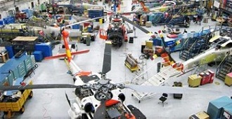 H-60 helicopters undergoing enhancements as part of the transition to the MH-60T model at the Aviation Logistic Center, Elizabeth City, N.C.