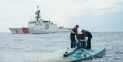 USCGC Stratton boarding team members take control of a self-propelled semi-submersible off the coast of Central America, August 2015.  U.S. Coast Guard photo