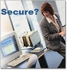 A woman sitting on a desk looking at a computer. There is text on the image that says 'Secure?'