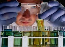 Scientist testing chemicals