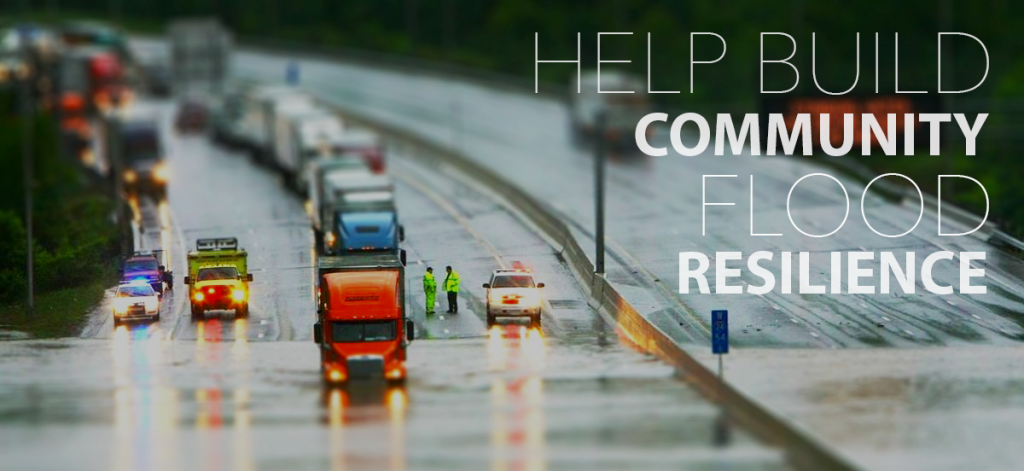 A flooded highway with the words, "Help Build Community Flood Resilience."