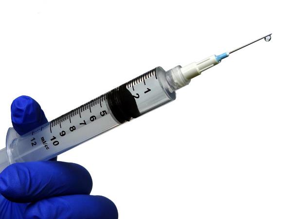 image of syringe with vaccine, Preparing for Possible Large Measles Outbreak