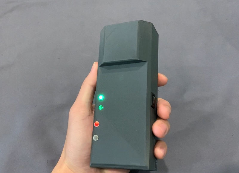 Prototype POINTER receiver, which is worn by responders entering a structure. What is now the size of a cell phone will ultimately be reduced in scale and potentially integrated into existing firefighting equipment.