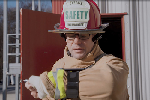 Firefighter uses DAISI for hands-free on-scene report logging and transcription to text.