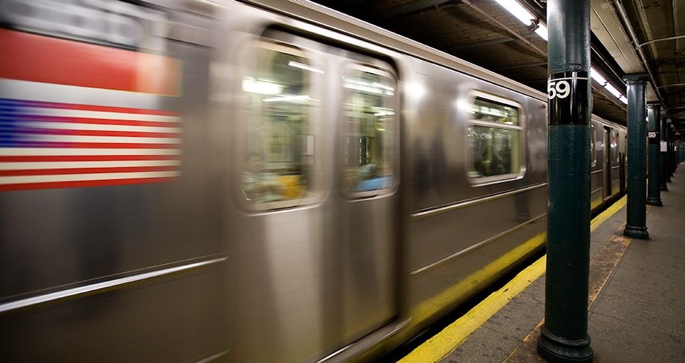 A train at a subway station.