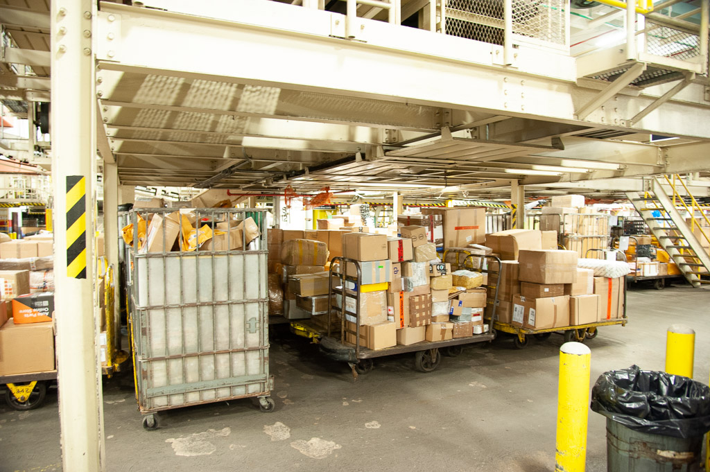 Millions of mail and packages from all corners of the world await screening at JFK International Mail Facility. 