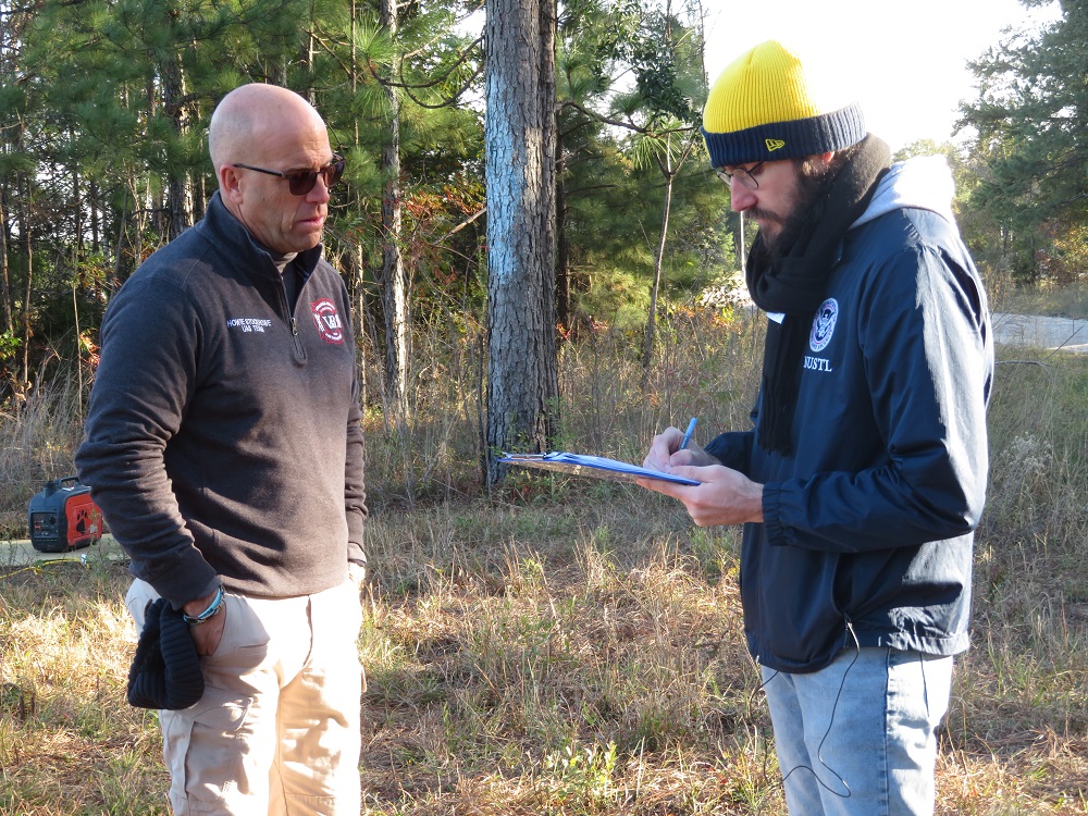 NUSTL representative Cody Bronnenberg (right) records feedback from UAS Trainer Coordinator Christopher Stockhowe (left) from the Virginia Beach Fire Department after he flew the EVO drone by Autel Robotics.