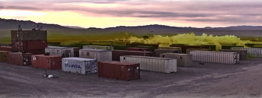 Chlorine spreads in a mock urban grid during one of the tests in Phase I of Jack Rabbit II. Some of the containers are configured to mimic residential and office structures where indoor chlorine concentration was measured.