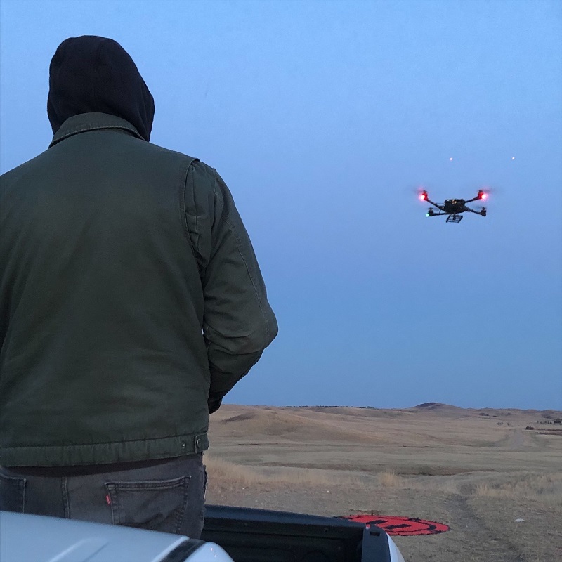 An operator tests an unmanned aircraft system near the northern border.