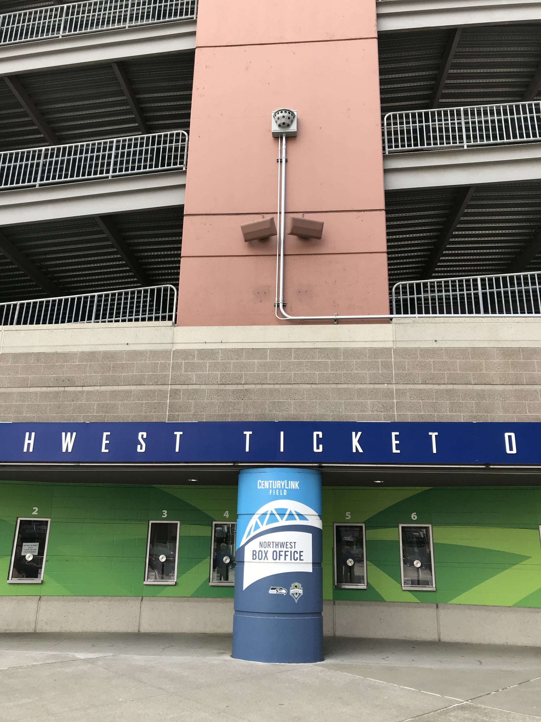 360-degree video surveillance camera, mounted to a stadium pillar.