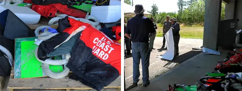 Left photo: Various used Coast Guard gear stand on wooden crates, including a torn red-and-navy Coast Guard vest, white rope, white Styrofoam objects and neon green board.  Right photo: On the right in the shade of a garage are various used Coast Guard gear as described in the left photo. A man stands with his back to the left.  A woman to the right holds a bending white rectangle bag that touches the ground.  Several people, some of which are below a wall-less white tent are watching her. 