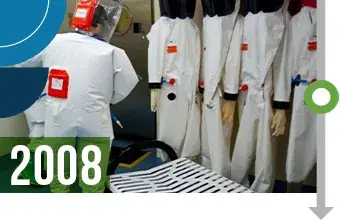 A display of white hazmat suits. 2008.