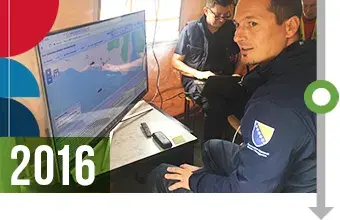 2016. First responder sitting in front of a monitor.