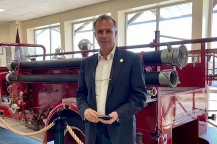 Under Secretary for Science and Technology Dimitri Kusnezov  in front of fire engine