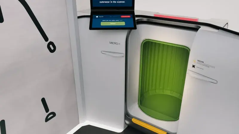 Concept design graphic of inside of white and green pod-based self-service screening system that includes a passenger screening panel on the left with a black stick figure person in the center, a display screen in the center with text instructions, and a small, green x-ray cabinet on the right that is big enough for a carry-on bag and personal belongings.