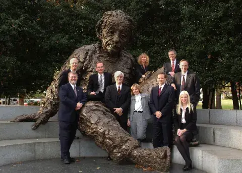 S&T founders and members of Transition Planning Office of DHS pose with statue of Albert Einstein at the National Academies in 2002.