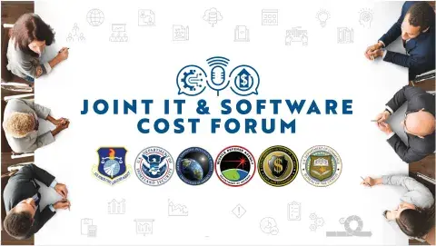 A birds eye view of a table with people sitting on either side. A logo saying Joint IT & Software Cost forum is in the middle of the table with some governmental seals