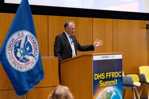 USST Kusnezov at FFRDC Summit speaking at a podium.