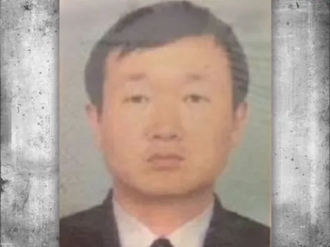Headshot photo of Myong Ho Ri.