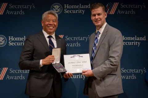 DHS Deputy Secretary John Tien with Secretary's Silver Medal recipient, Matthew Ryan.