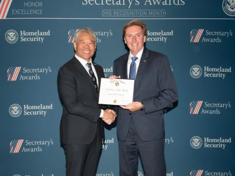 DHS Deputy Secretary John Tien and Secretary's Gold Medal recipient Richard M. Deasy.