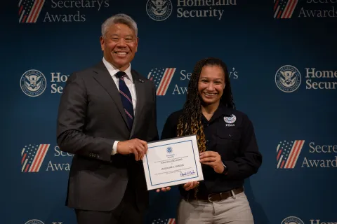 DHS Deputy Secretary John Tien with Team Excellence Award recipient, Jacqueline E. Cardoza. 
