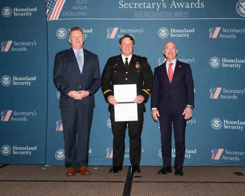 Left to right: U.S. Secret Service Director James Murray, Valor Award recipient Jacob R. Karpinski, and DHS Secretary Alejandro Mayorkas.