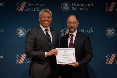 DHS Deputy Secretary John Tien with Team Excellence Award recipient, Marc Koblentz.